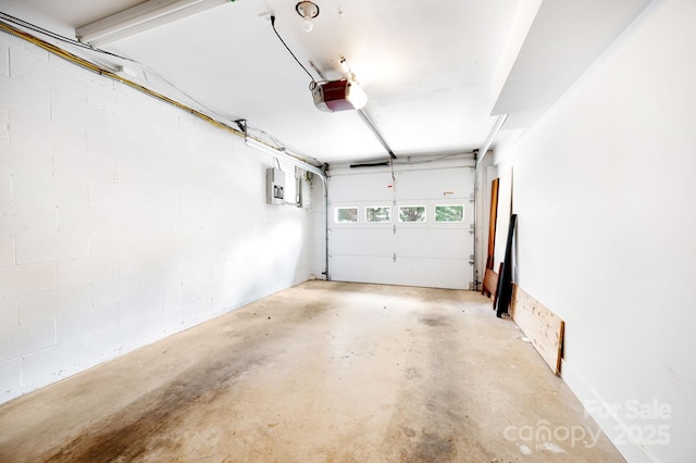 36 Brookcliff Dr, Asheville, NC 28804 - garage with electric panel and a garage door opener