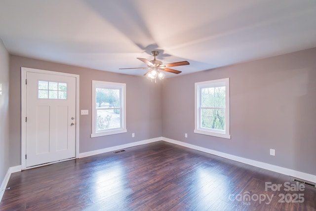 6282 Richburg Rd, Great Falls, SC 29055 - foyer featuring dark wood-style floors, visible vents, baseboards, and ceiling fan