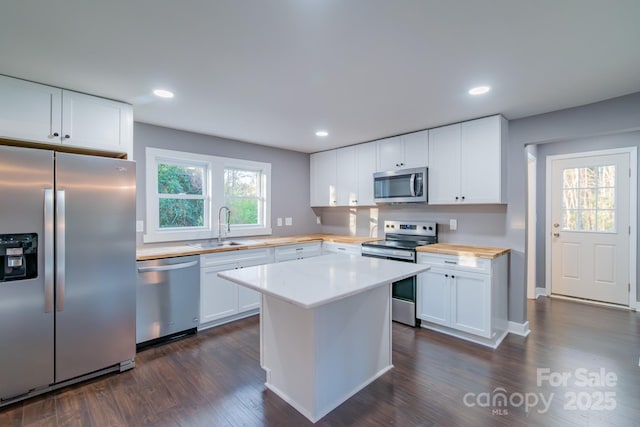 6282 Richburg Rd, Great Falls, SC 29055 - kitchen with a sink, white cabinetry, and stainless steel appliances