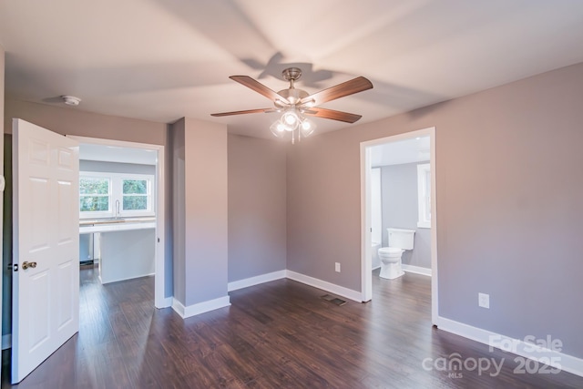 6282 Richburg Rd, Great Falls, SC 29055 - unfurnished bedroom with visible vents, ensuite bath, dark wood-type flooring, and baseboards