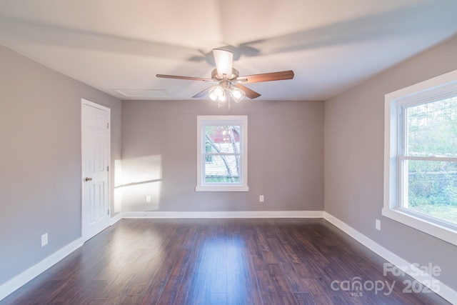 6282 Richburg Rd, Great Falls, SC 29055 - empty room with dark wood finished floors, plenty of natural light, a ceiling fan, and baseboards