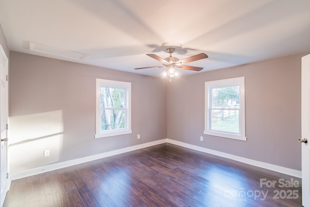 6282 Richburg Rd, Great Falls, SC 29055 - empty room featuring dark wood-style floors, attic access, baseboards, and a ceiling fan