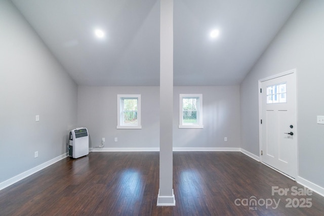 6282 Richburg Rd, Great Falls, SC 29055 - additional living space with heating unit, baseboards, dark wood-style flooring, and vaulted ceiling
