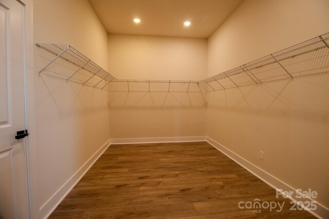 1370 Coppergate Dr, Salisbury, NC 28147 - walk in closet featuring dark wood finished floors