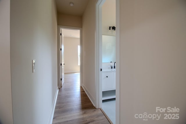 1370 Coppergate Dr, Salisbury, NC 28147 - hall featuring light wood finished floors and baseboards