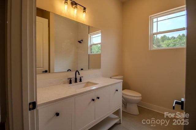 1370 Coppergate Dr, Salisbury, NC 28147 - bathroom featuring plenty of natural light, vanity, tile patterned floors, and a shower