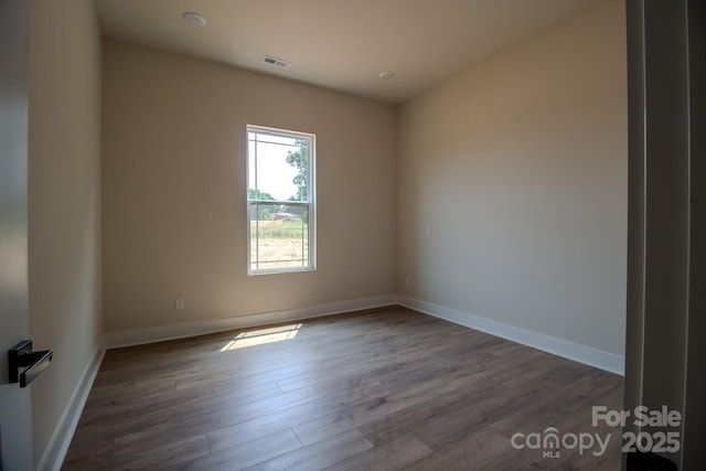 1370 Coppergate Dr, Salisbury, NC 28147 - empty room with wood finished floors and baseboards