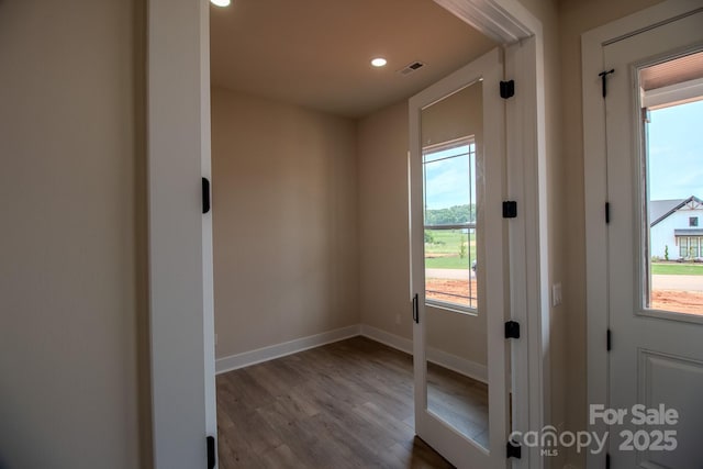1370 Coppergate Dr, Salisbury, NC 28147 - doorway to outside with dark wood-type flooring and recessed lighting