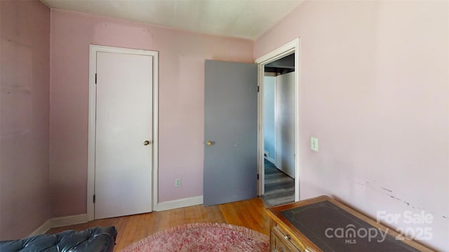 11 Season Ln, Asheville, NC 28805 - unfurnished bedroom featuring light wood-style flooring and baseboards