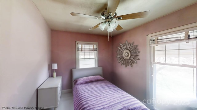 11 Season Ln, Asheville, NC 28805 - bedroom featuring a ceiling fan and baseboards