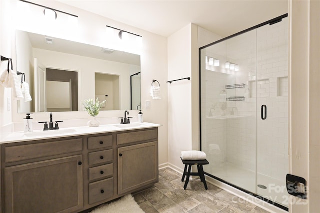 13024 Suncreek Ter, Charlotte, NC 28214 - full bath with visible vents, a sink, a shower stall, and double vanity