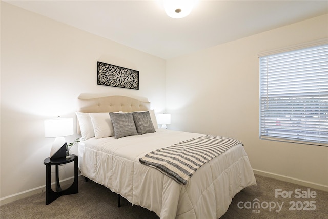 13024 Suncreek Ter, Charlotte, NC 28214 - carpeted bedroom featuring baseboards and multiple windows