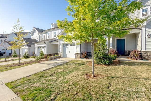 13024 Suncreek Ter, Charlotte, NC 28214 - view of front of property with a residential view, driveway, stone siding, and a front yard