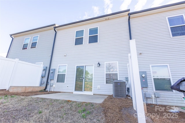 13024 Suncreek Ter, Charlotte, NC 28214 - back of house with fence, a patio area, and central AC
