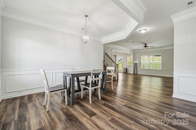 117 Cramerton Mills Parkway, Cramerton, NC 28032 - dining space with crown molding, stairway, dark wood finished floors, and visible vents
