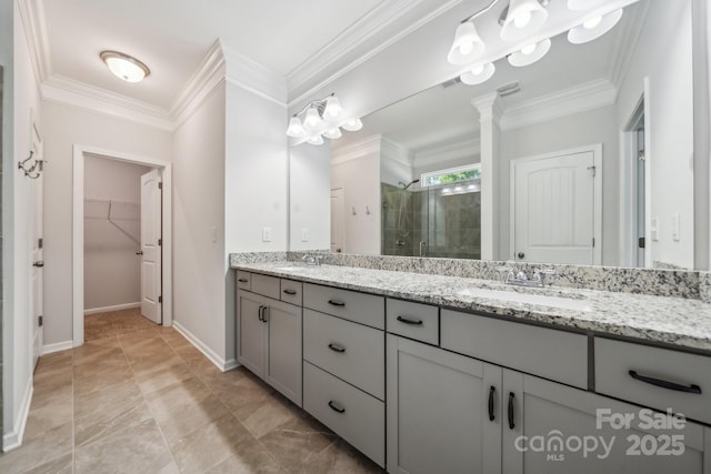 117 Cramerton Mills Parkway, Cramerton, NC 28032 - bathroom with crown molding, double vanity, a walk in closet, a sink, and a stall shower