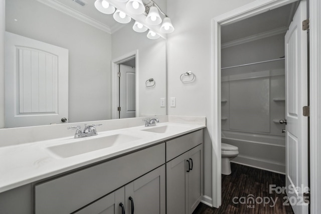 117 Cramerton Mills Parkway, Cramerton, NC 28032 - full bath with double vanity, a sink, wood finished floors, and ornamental molding
