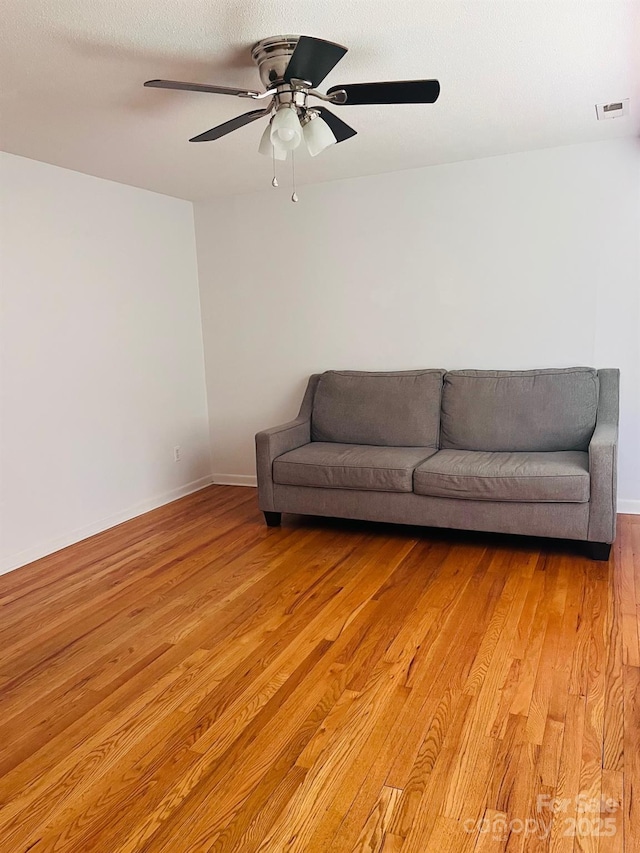 3232 Wilson Heights Dr, Hildebran, NC 28637 - living room featuring light wood finished floors and ceiling fan