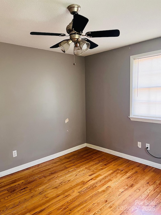 3232 Wilson Heights Dr, Hildebran, NC 28637 - spare room with light wood finished floors and ceiling fan