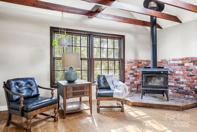 203 Davis Mountain Rd, Laurel Park, NC 28739 - sitting room with wood finished floors and a wood stove