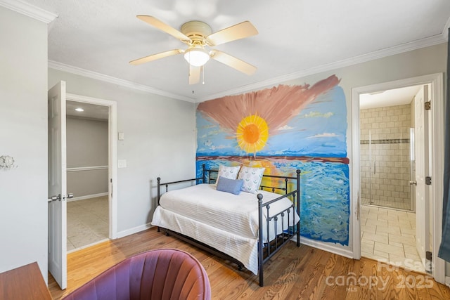 203 Davis Mountain Rd, Laurel Park, NC 28739 - bedroom with ornamental molding, wood finished floors, connected bathroom, and a ceiling fan