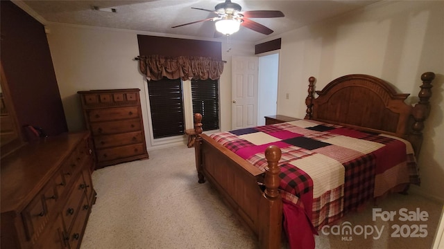 bedroom with crown molding and ceiling fan