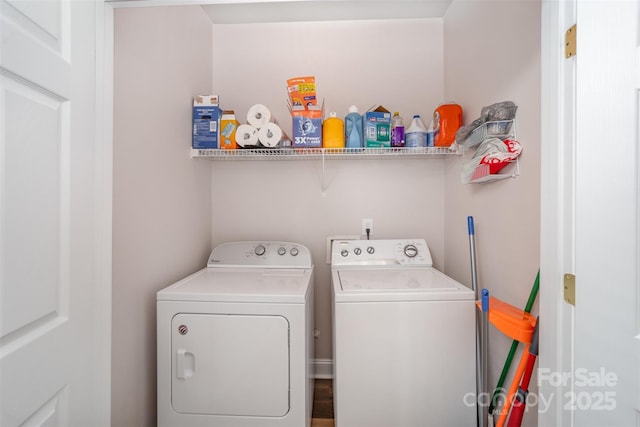 laundry area with washer and dryer and laundry area