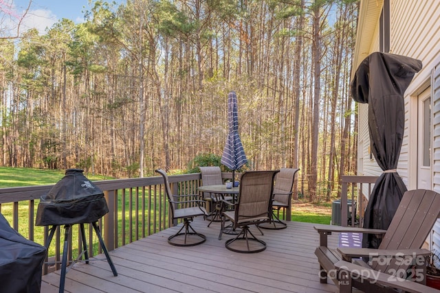 7025 Ridgeway Rd, Stanley, NC 28164 - deck with outdoor dining space and a yard
