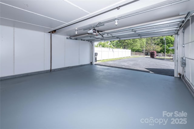 garage featuring a garage door opener