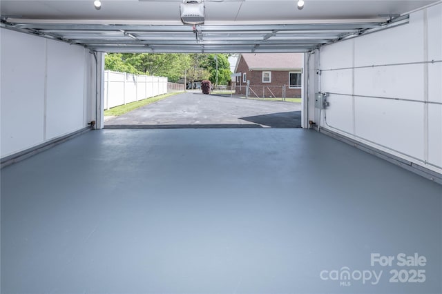 garage with a garage door opener