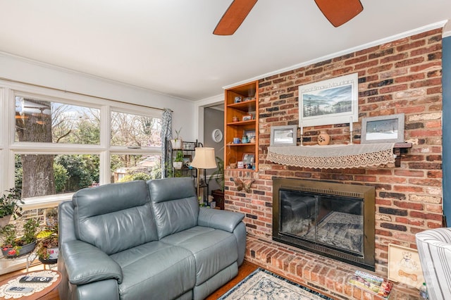 1041 Cutler Pl, Charlotte, NC 28212 - living room featuring a ceiling fan, crown molding, and a brick fireplace