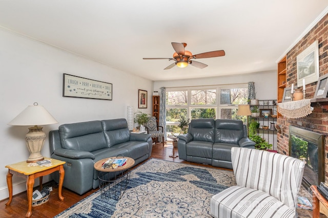 1041 Cutler Pl, Charlotte, NC 28212 - living area featuring wood finished floors, ceiling fan, and a brick fireplace