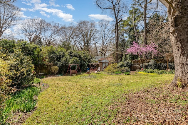 1041 Cutler Pl, Charlotte, NC 28212 - view of yard with a playground and fence