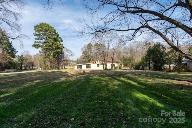 view of yard featuring fence
