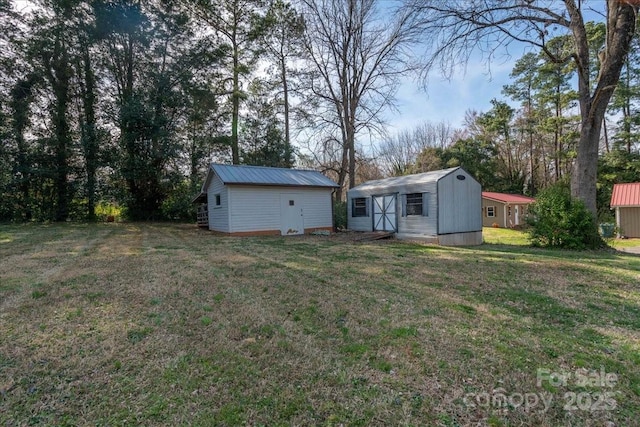 view of yard with a storage unit and an outdoor structure