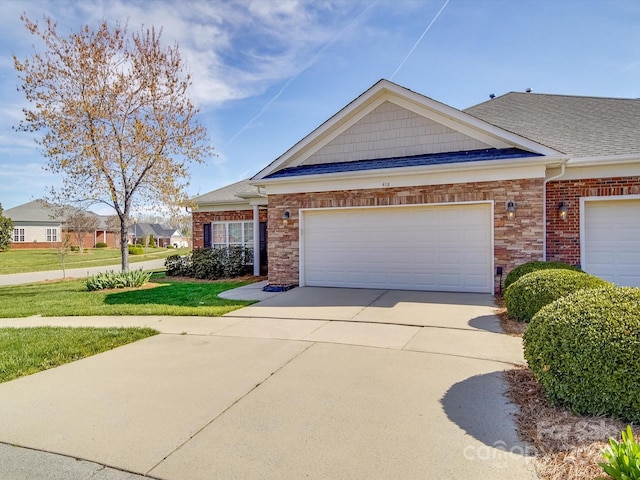 4118 Compostela Ct, Monroe, NC 28110 - view of front of property with a shingled roof, concrete driveway, a garage, and a front lawn