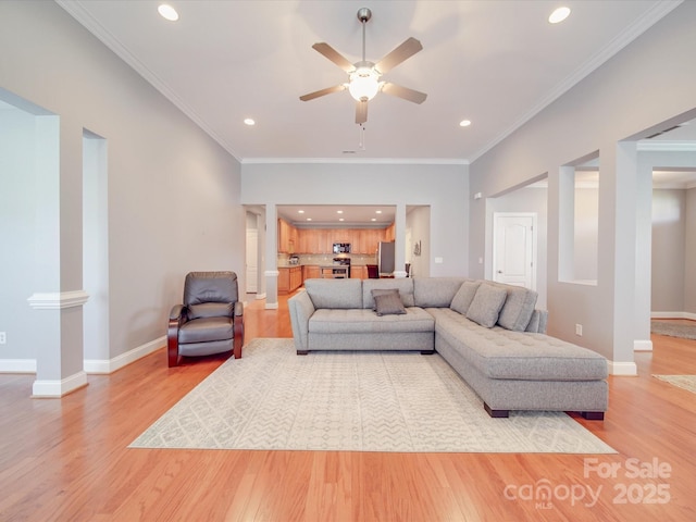 4118 Compostela Ct, Monroe, NC 28110 - living room with a ceiling fan, light wood finished floors, baseboards, ornamental molding, and recessed lighting