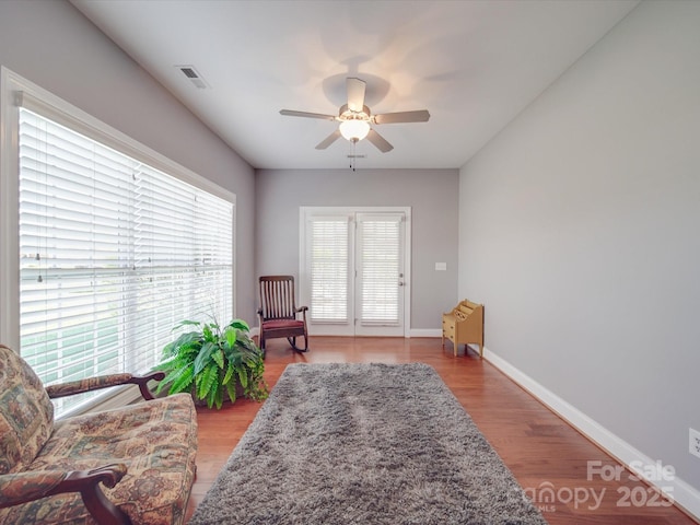 4118 Compostela Ct, Monroe, NC 28110 - sitting room with light wood finished floors, baseboards, visible vents, and a ceiling fan