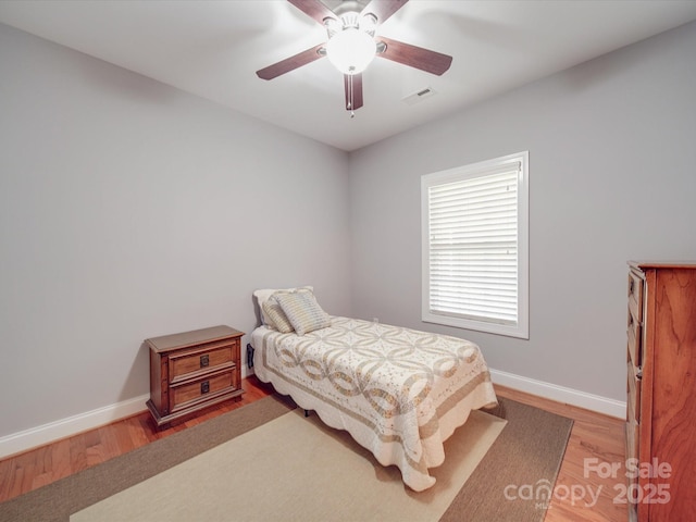 4118 Compostela Ct, Monroe, NC 28110 - bedroom with baseboards, visible vents, and wood finished floors