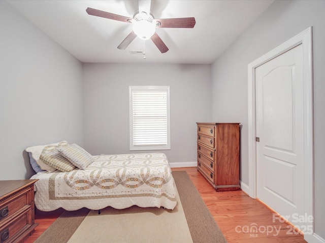 4118 Compostela Ct, Monroe, NC 28110 - bedroom with baseboards, light wood-style floors, and ceiling fan