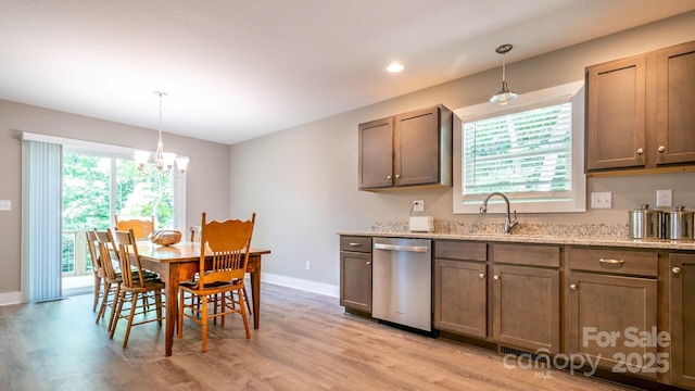 28 Arnie Dr, Etowah, NC 28729 - kitchen with a sink, light wood finished floors, dishwasher, and a healthy amount of sunlight