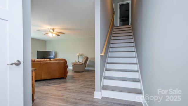 28 Arnie Dr, Etowah, NC 28729 - stairway with baseboards, a ceiling fan, and wood finished floors