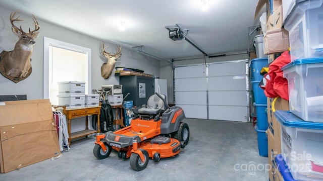 28 Arnie Dr, Etowah, NC 28729 - garage featuring a garage door opener