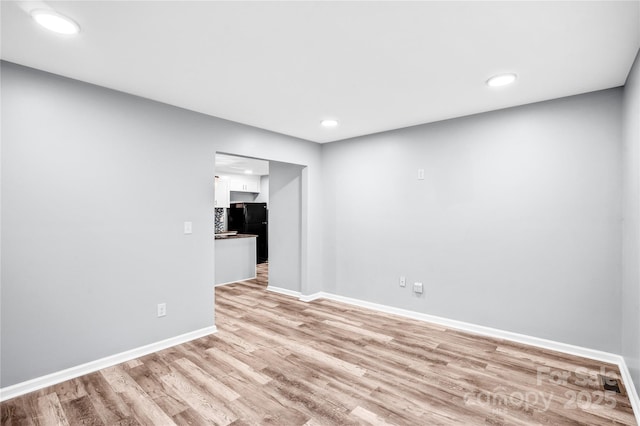 6628 Cool Water Ct, Charlotte, NC 28215 - empty room featuring light wood-type flooring, baseboards, and recessed lighting