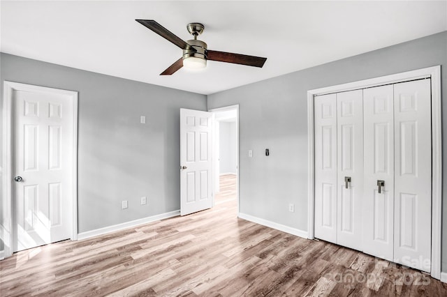 6628 Cool Water Ct, Charlotte, NC 28215 - unfurnished bedroom with wood finished floors, baseboards, a closet, and ceiling fan