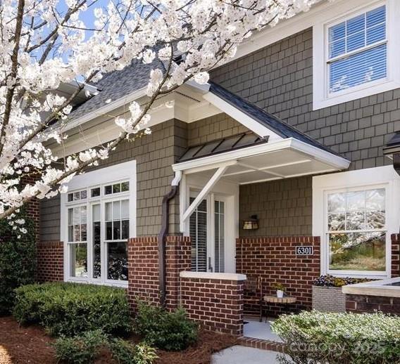 6301 Park Dr S, Charlotte, NC 28210 - entrance to property with brick siding and a standing seam roof