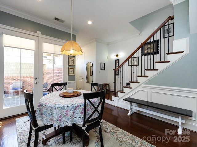6301 Park Dr S, Charlotte, NC 28210 - dining room featuring french doors, dark wood finished floors, stairs, ornamental molding, and recessed lighting