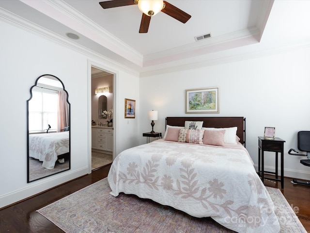 6301 Park Dr S, Charlotte, NC 28210 - bedroom with crown molding, dark wood finished floors, baseboards, connected bathroom, and ceiling fan