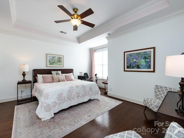 6301 Park Dr S, Charlotte, NC 28210 - bedroom featuring a raised ceiling, crown molding, dark wood-type flooring, baseboards, and ceiling fan