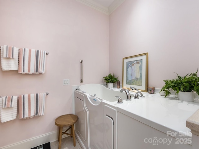 6301 Park Dr S, Charlotte, NC 28210 - full bathroom with crown molding, a whirlpool tub, and baseboards